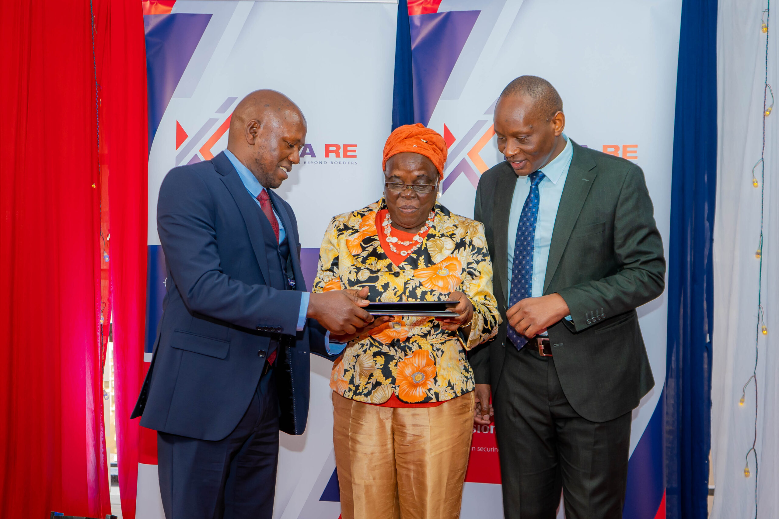 (Left) Kenya Re Group Managing Director, Dr. Hillary Wachinga, (Center) with Hon. Catherine Kimura, Chair of the Board of Directors of Kenya Re, and Charles Kariuki, Corporation Secretary (Right).