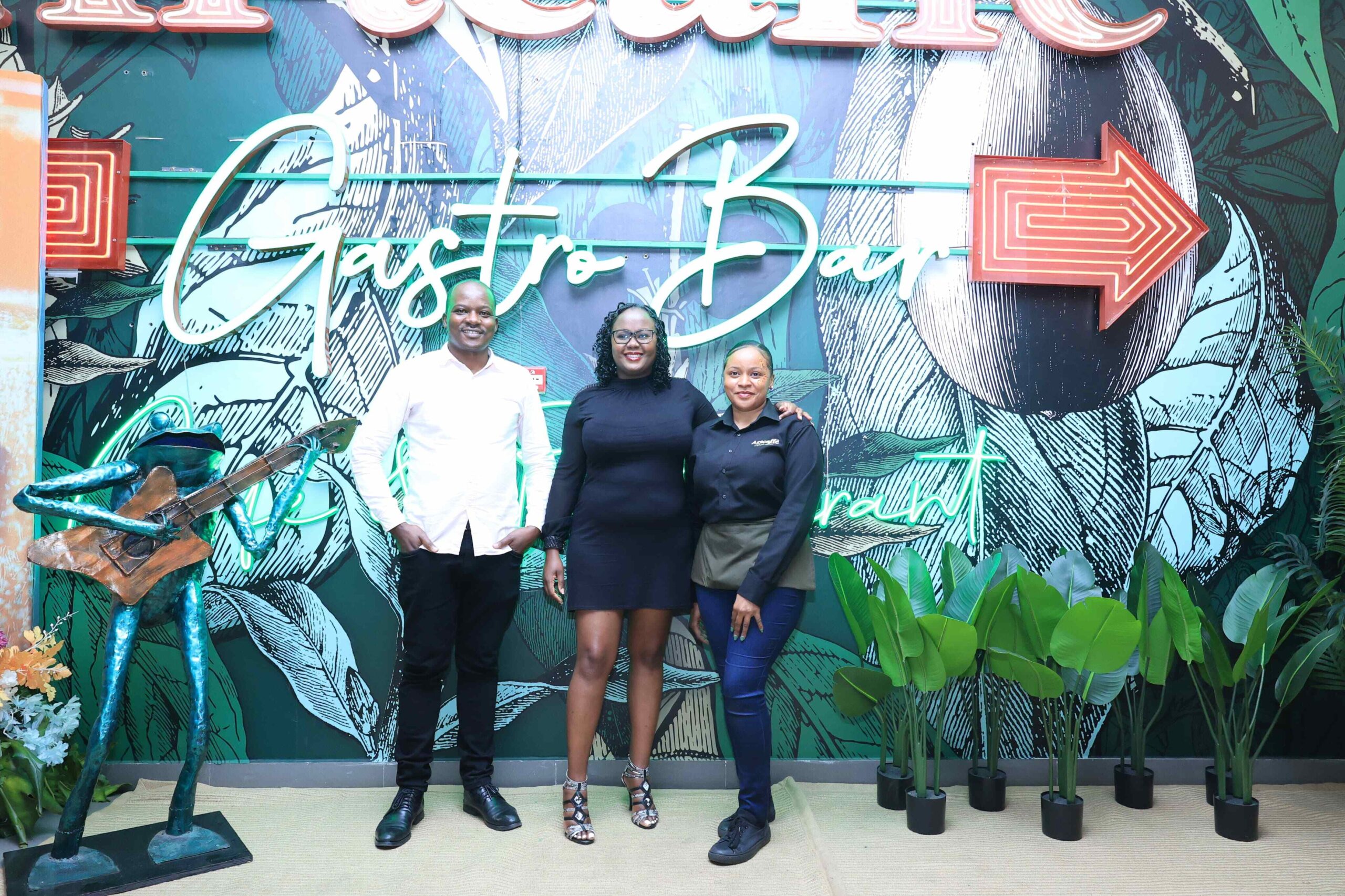 Artcaffe Regional Manager Alfonce Nzyuko, Head of Customer Care Services Jackie Mwanza, and service attendant Faith Bulimu during the opening launch of Artcaffe Gastro Bar Imara mall along Mombasa Road.