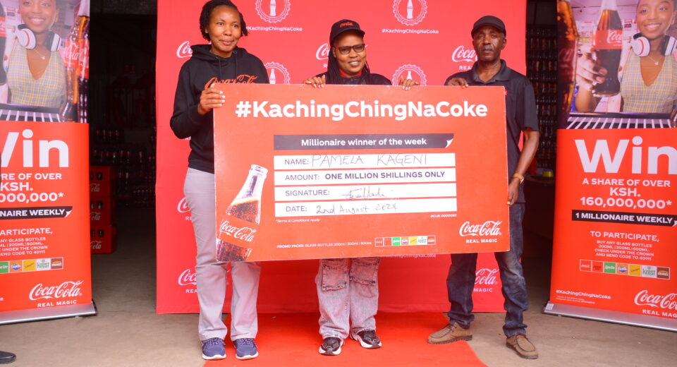 (L-R) Regional Trade Marketing Manager Nairobi, Coca- Cola Bottlers Kenya, Shilah Shitanda, Ksh 1Million winner Pamela Kageni from Nairobi and Area Sales Manager, Eastleigh District, Coca-Cola Bottlers Kenya, Ben Momanyi during the presentation of a cheque to one of the winners of the Kachingching na Coke campaign.