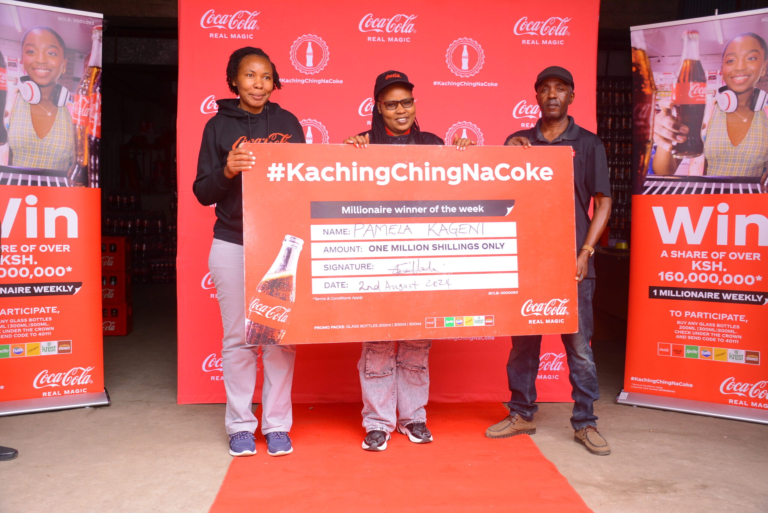 (L-R) Regional Trade Marketing Manager Nairobi, Coca- Cola Bottlers Kenya, Shilah Shitanda, Ksh 1Million winner Pamela Kageni from Nairobi and Area Sales Manager, Eastleigh District, Coca-Cola Bottlers Kenya, Ben Momanyi during the presentation of a cheque to one of the winners of the Kachingching na Coke campaign.
