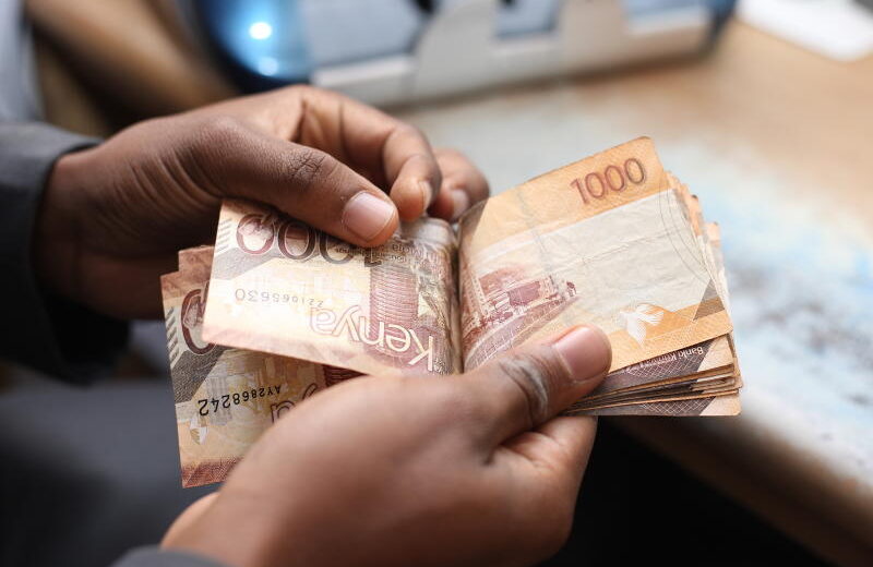 kenyan money in hand