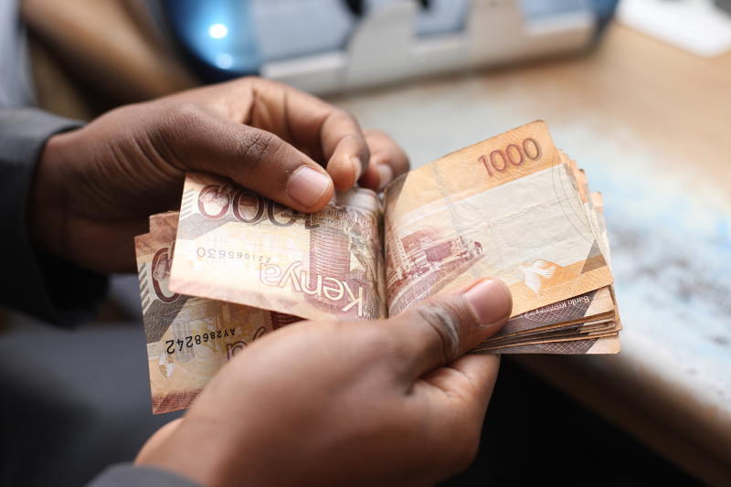 kenyan money in hand