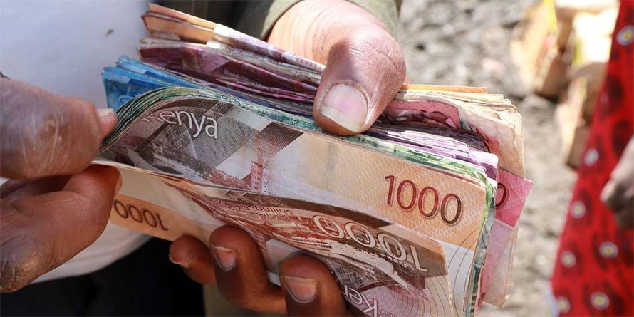 kenyan money ksh in hand
