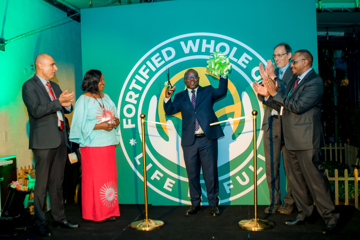 Hon. Minister Jean Claude Musabyimana (centre) of Rwanda's Ministry of Local Government officially launches the Fortified Whole Grain Alliance (FWGA) at the Africa Food Systems Conference Summit, hosted by the Government of Rwanda. He was joined by David Kamau, Managing Director - Fortified Whole Grain Alliance (Right) and from The Rockefeller Foundation, Roy Steiner - Senior Vice President, Food, Peiman Milani - Director, Food and Betty Kibaara - Director, Food Initiative.