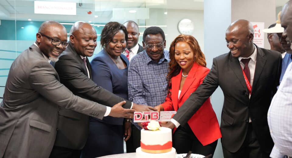 H.E James Orengo, Governor of Siaya County, leads the Diamond Trust Bank (DTB) executive team in cutting the cake during the official launch of the DTB Bondo branch in Bondo, Siaya County. The DTB team was represented by George Otiende, Director of Retail Banking; Dr. Kennedy Nyakomitta, Director of Commercial Banking; and Lillian Ngala, Director of Human Resources.