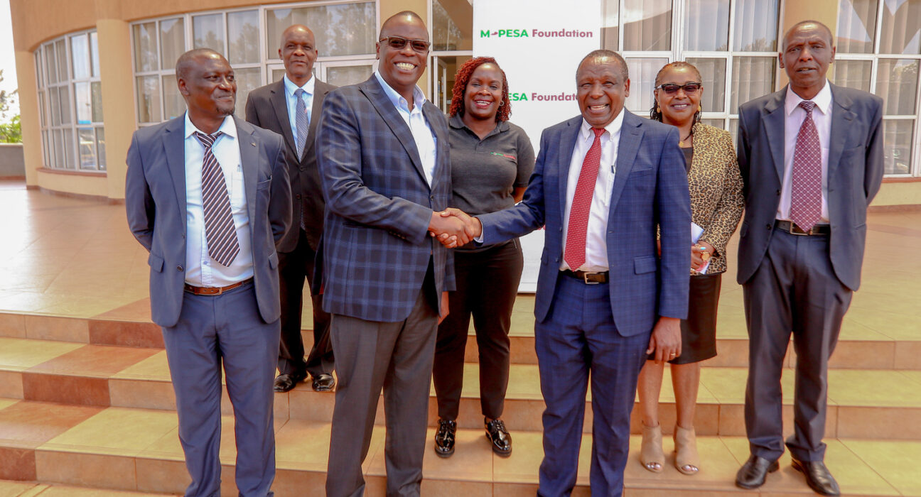 Safaricom Foundation Trustee Nicholas Kamuyu (Left) and University of Embu Vice Chancellor Prof Daniel Mugendi during the Launch of the M-PESA Foundation University of Embu TVET Scholarship programme in Embu County.