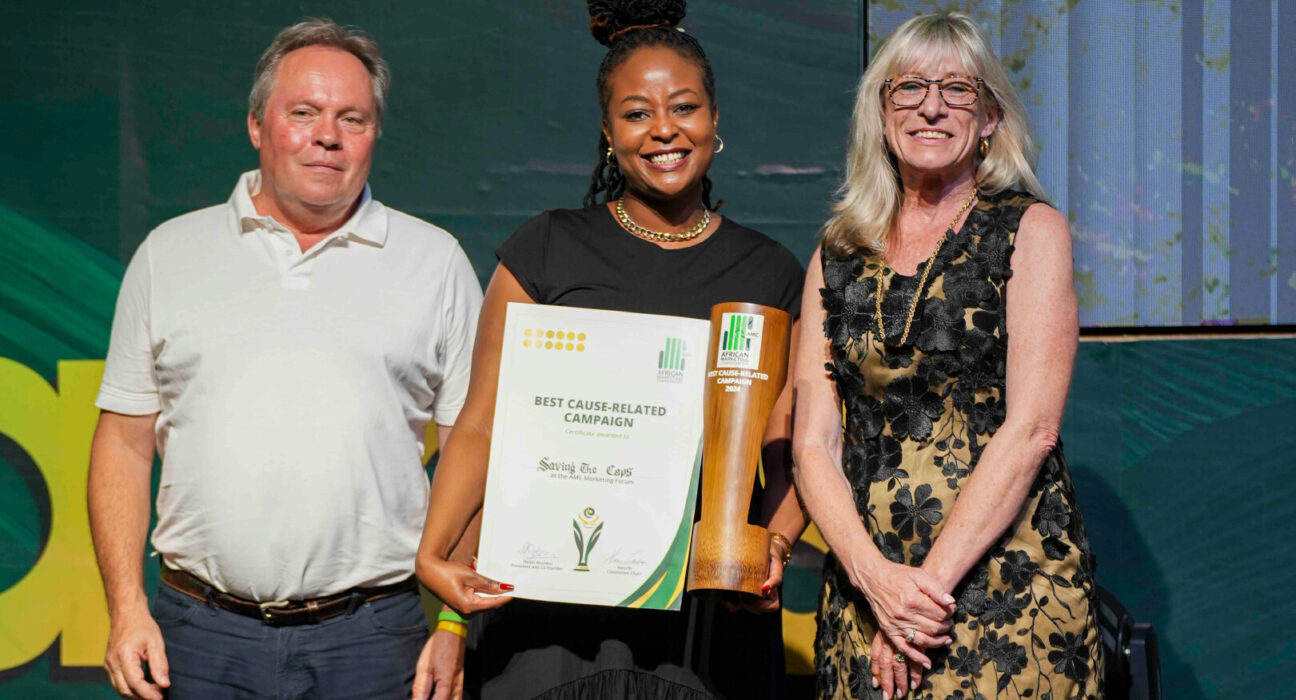 photo of the winners of the best cause related campaign. White Cap Kenya won gold for its Saving the White Caps project L-R Nigel Tattersall, Gloria Kaburu and Helen McIntee