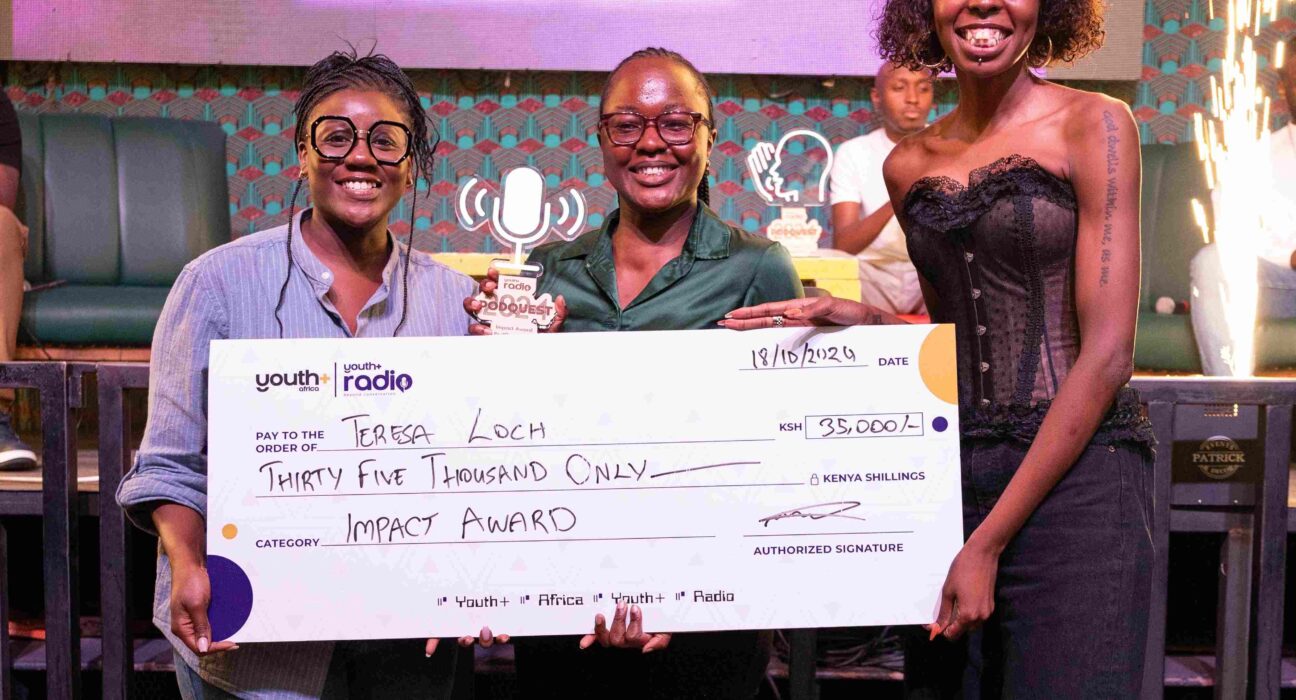 Mariah Mariah, Media personality and 1/3 at Mic Cheque podcast, Teresa Loch Impact Award winner, Adelle Onyango, Founder of the Legally Clueless podcast and media personality pose for a picture with dummy cheque at the Inaugural Youth+ Radio PodQuest 2024 Award Ceremony at Alchemist, Westlands.