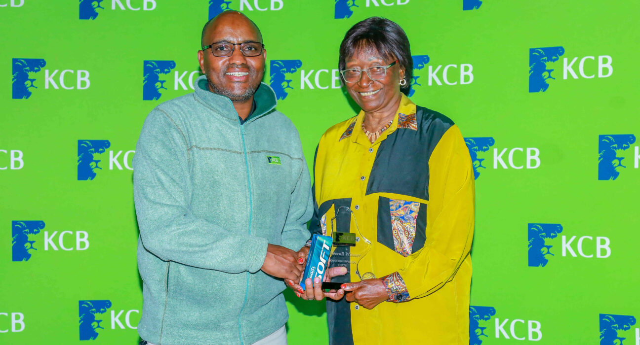 KCB Group CEO Paul Russo awards the overall winner 16th leg of the KCB East Africa Golf Tour Hellen Kurutu at the 9-hole Nanyuki Golf Course on September 7, 2024.