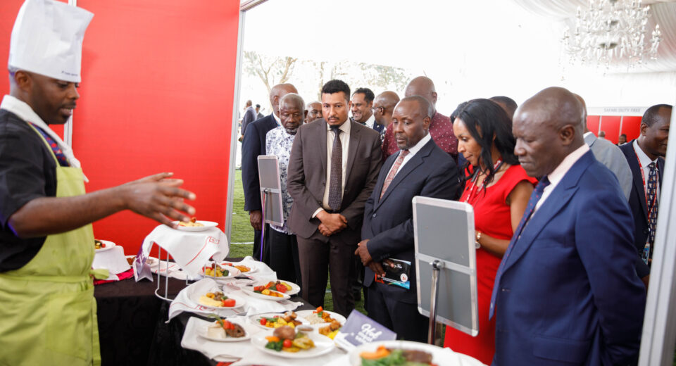 PS Ministry of Roads and Transport Mr. Mohamed Daghar and Kenya Airways CEO Allan Killavuka, alongside other dignitaries reviewing the duty-free product selection during the inflight product selection 2025 event