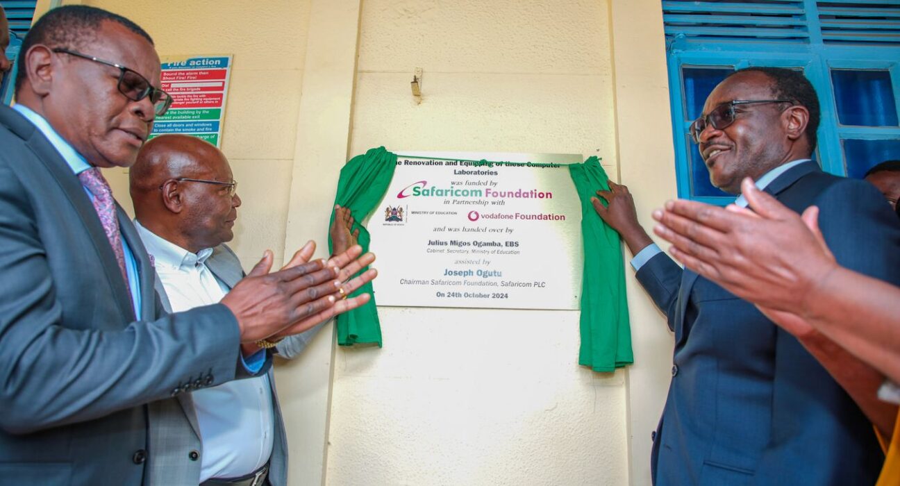 Julius Migos Ogamba, EBS, Cabinet Secretary, Ministry of Education (Right) and Joseph Ogutu, Chairman, Safaricom Foundation, (Left) officially launch a newly renovated ICT Lab at Machakos Teachers Training College during the launch of the Scaling Digital Skills programme .