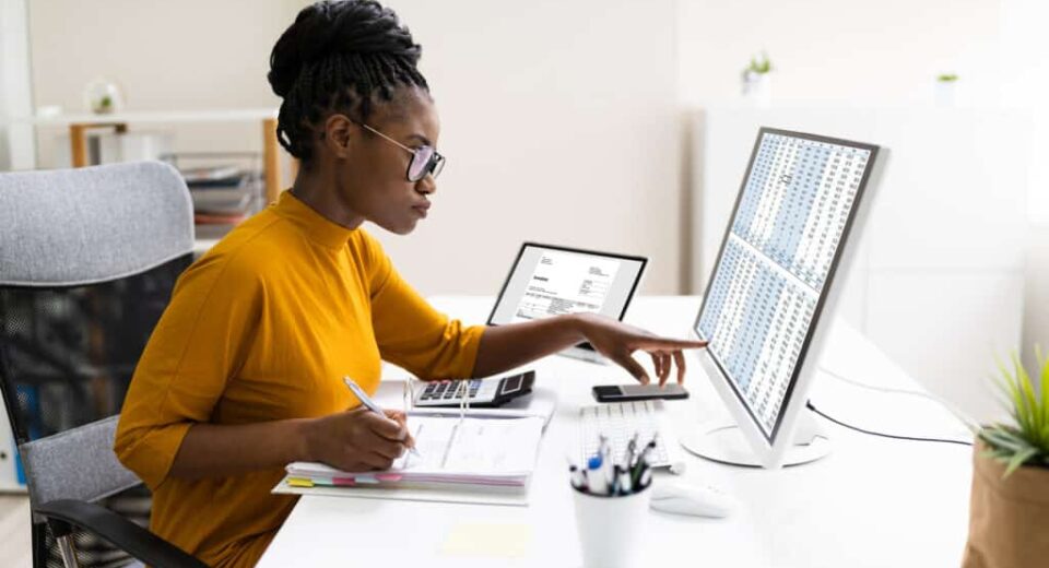 Kenyan Woman Accountant on computer