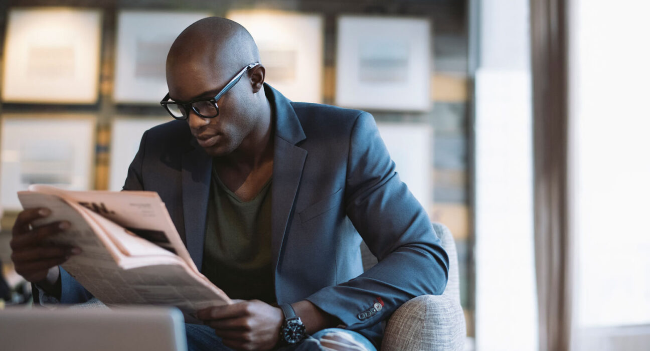 Man Reading paper
