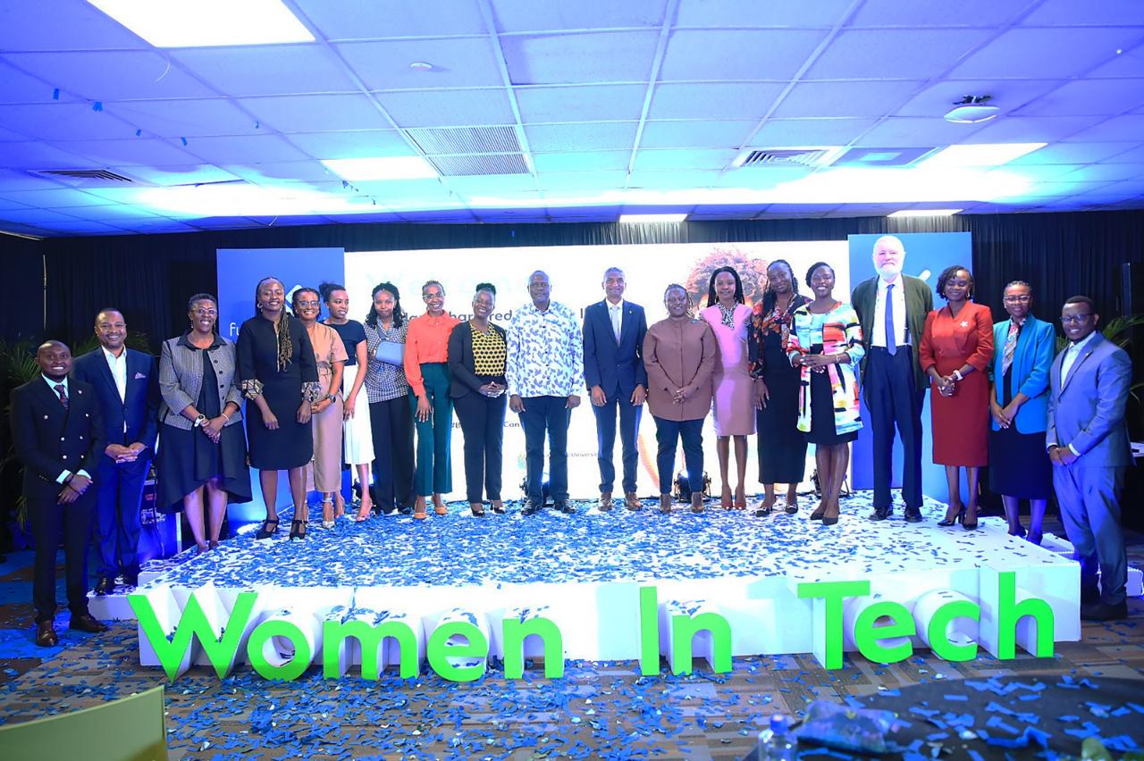 Mr. Kariuki Ngari, Managing Director and CEO of Standard Chartered Kenya and Africa (center), and Dr. Vincent Ogutu -Vice Chancellor of Strathmore University (center), poses with the top 7 winners of the Standard Chartered Women in Tech Cohort 7 program. Accompanying them are senior management members from Standard Chartered and Strathmore University.