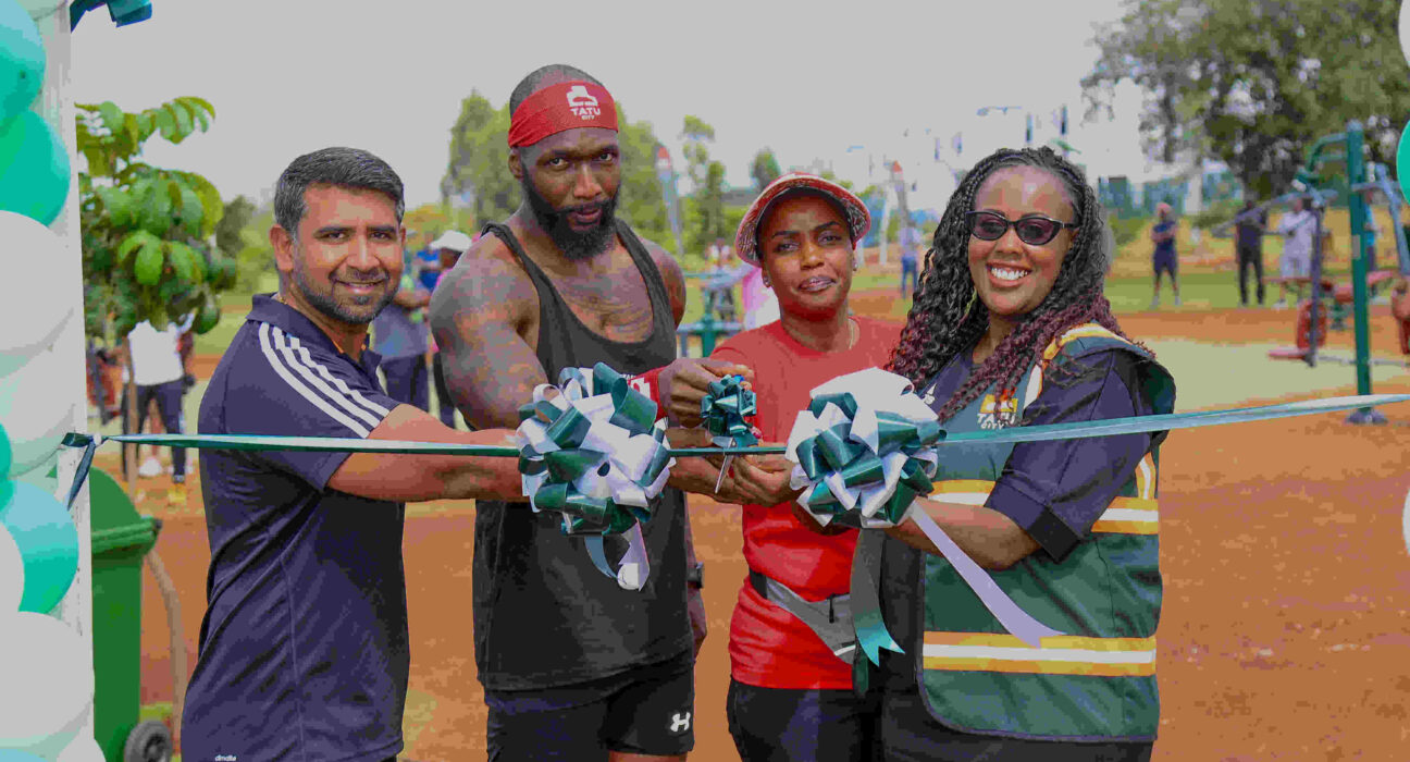 L-R, Amit Joshi, Senior Project Manager, Tatu City, Kelvin Owako, Fitness Trainer, Kanana Ndegwa, Head of Marketing, Unity Homes, and Angela Muthoga, Events and Sustainability Manager Tatu City, cut a ribbon to launch the outdoor gym at Tatu City.