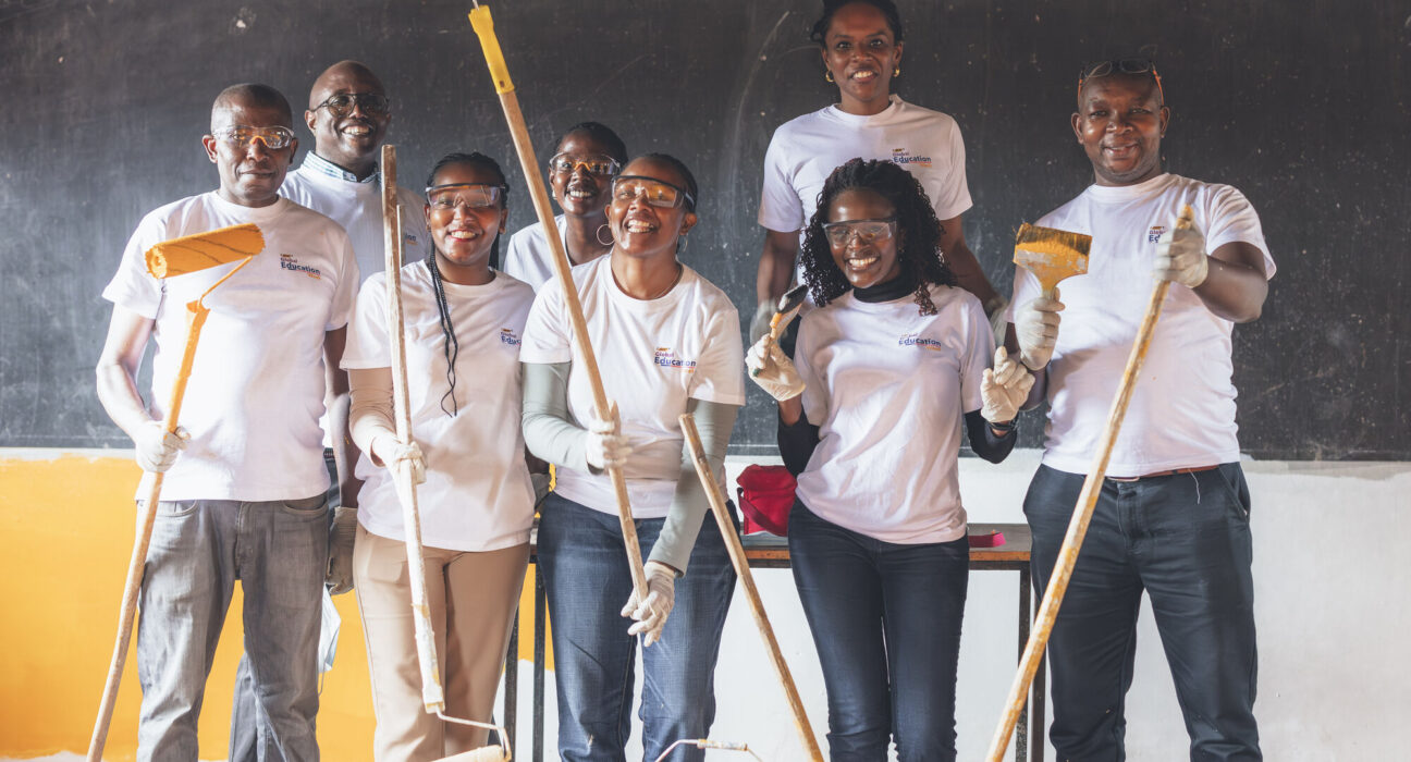 Salome Ngugi, BIC East AFrica Marketing Team Centre with BIC Team Painting Mwiki Primary School, GIthurai (1)