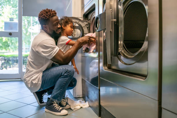 person using washing machine