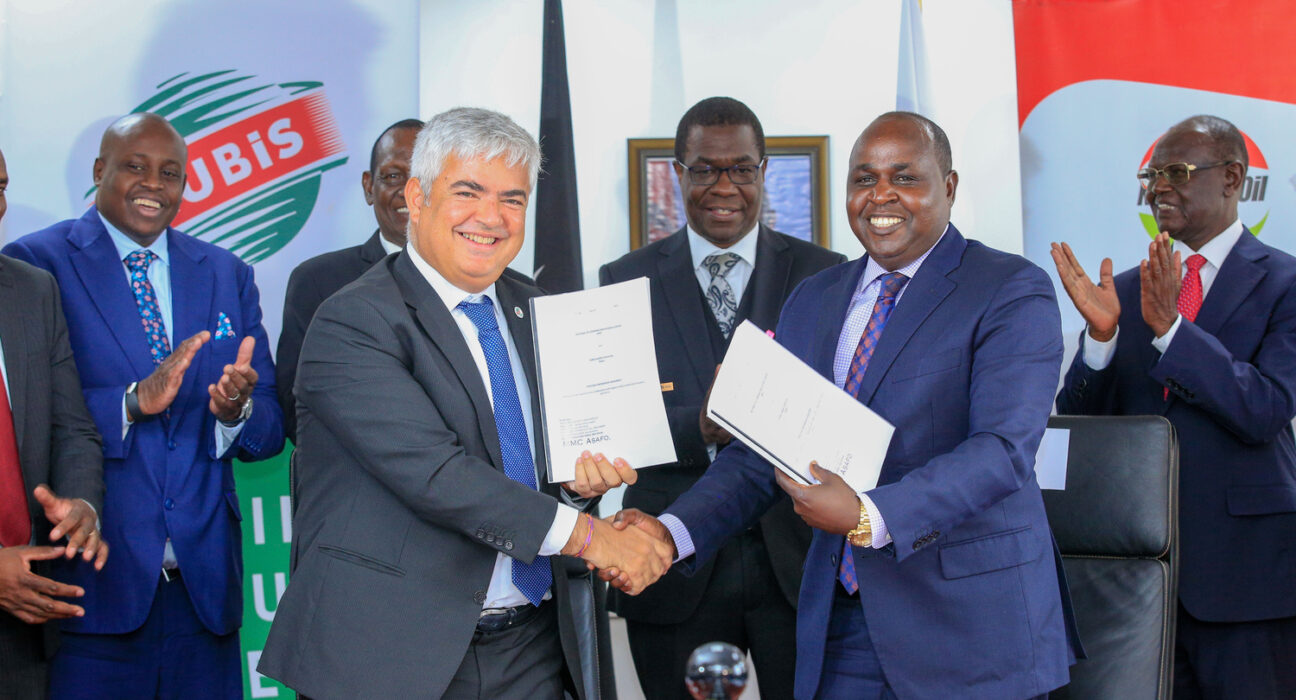 From Left (in front): Olivier Sabrié - RUBiS Energie East Africa Group CEO and Managing Director of RUBiS Energy Kenya and Leparan Ole Morintat - CEO & Managing Director of NOC shake hands after signing a non-equity strategic partnership agreement at Kawi Complex earlier today. Looking on is (2nd row) Mr. Daniel Kiptoo Bargoria- Director General of the Energy and Petroleum Regulatory Authority (EPRA), Mr. Mohamed Liban, Principal Secretary for the State Department for Petroleum, Hon. Opiyo Wandayi, Cabinet Secretary for Energy and Petroleum, and Kiraitu Murungi E.G.H, Chairman of the National Oil Corporation.
