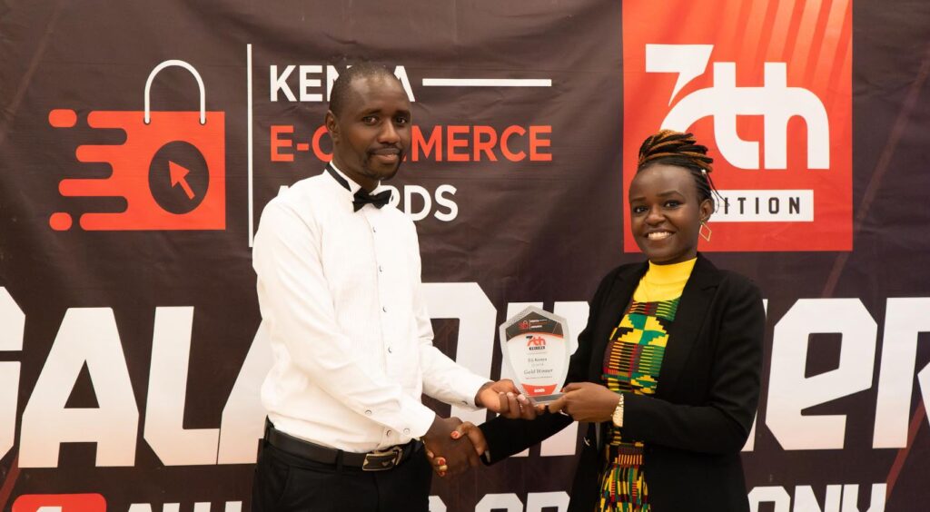 Photo 1: (L-R) Dennis Njoka, Vibrant Digital handovers award to Jiji's PR Manager, Maureen Naliaka at the Kenya E-commerce Awards 2025