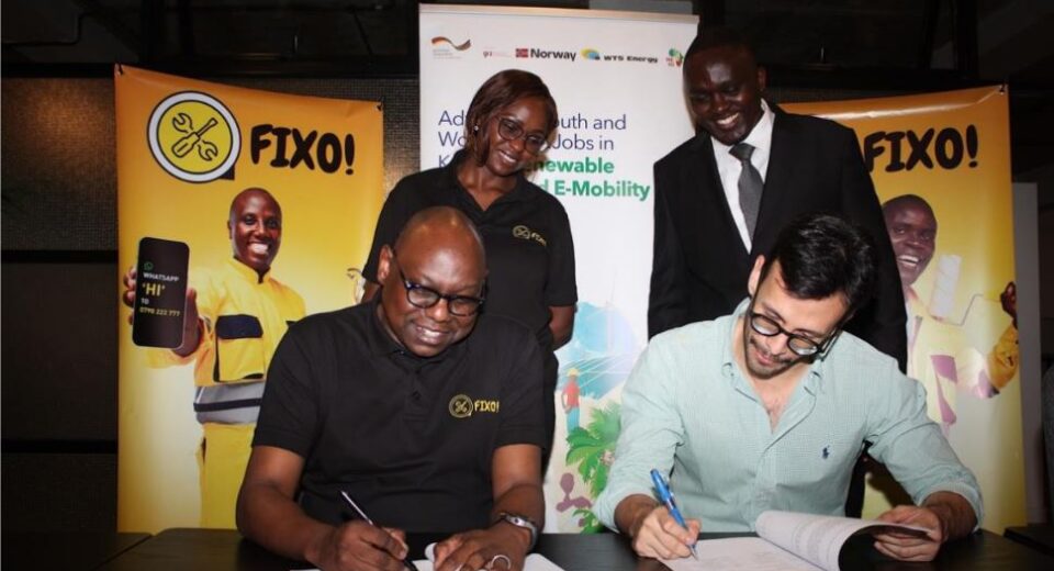 PARTNERSHIP: Levi Nyakundi (left), Chief Executive Officer for Fixo Solutions and Jose Rivera (right) General Manager for TMS Foundation formalize an agreement that will enable trained and certified solar installation technicians access employment opportunities through Fixo’s digital e-hailing platform. The platform, which was launched earlier this year, connects households and institutional clients to vetted and skilled handymen such as plumbers, painters, carpenters, electricians and welders. TMS Foundation runs training programes across East Africa, aimed at establishing a pool of trained professionals in renewable energy. The partnership with Fixo is expected to provide the newly trained technicians with a structured pathway to gainful employment. Looking on, are Julia Kwamboka, the Chief Growth Officer and Fixo Solutions and Wilson Maingi, the Program Manager at WTS Foundation.