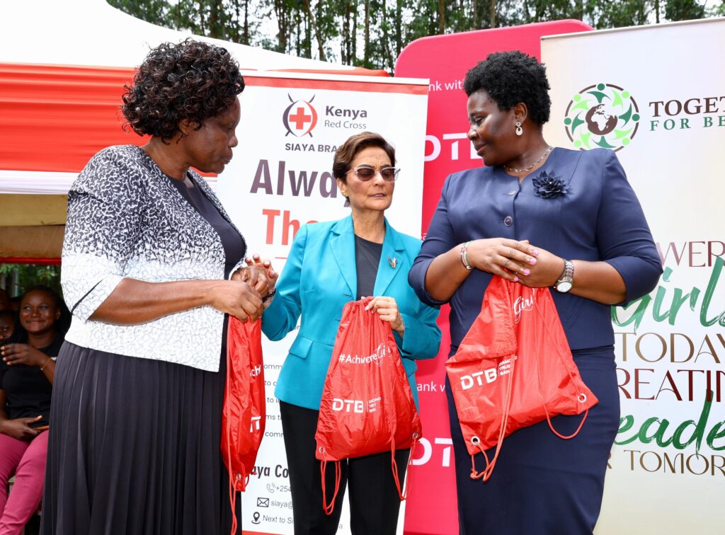 From Left: Mary Agunda - Senior Principal Sinaga Girls Secondary School, Nasim Devji – Group CEO at Diamond Trust Bank (DTB) and Grace Agola - CECM Trade Siaya County during the official roll out of the #AchieveMore Girl initiative at Sinaga Girls in Siaya County.