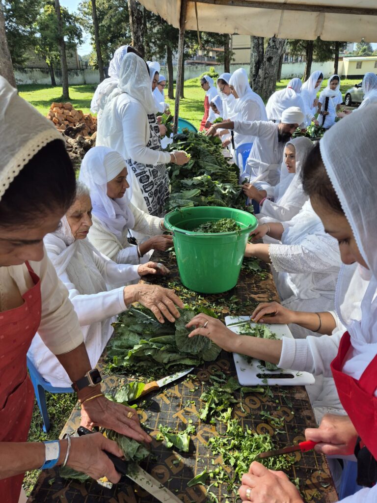 Image 2 - Volunteers came together to prepare free meals for attendees of the Kericho Peace Festival