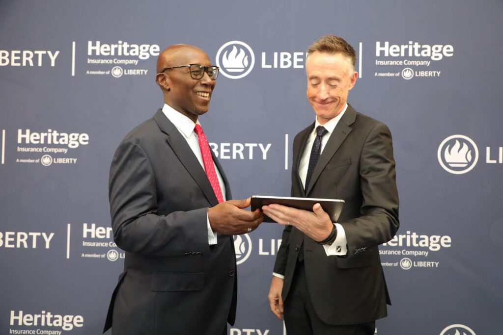 Liberty Kenya Holdings Plc Chairman Phillip Odera (R) and Group Chief Executive Officer Kieran Godden at the company's first-half 2025 results presentation at Liberty House in Nairobi. The insurer reported earnings of KShs 260 million and announced digital transformation plans following the successful completion of its Tanzania operations sale for KShs 503 million.