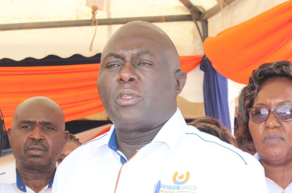 Univision Sacco Chairman Reverend Augustus Munuve speaking during the function.