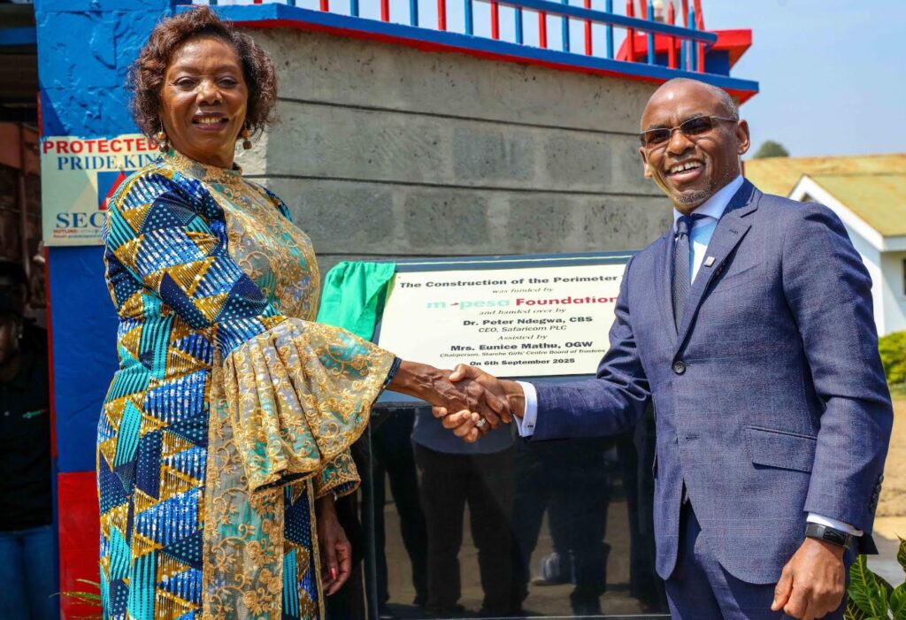 Dr. Peter Ndegwa, Group CEO of Safaricom Group (right), officially hands over a newly constructed perimeter wall funded by the M-Pesa Foundation to Mrs. Eunice Mathu, Chairperson of the Starehe Girls Centre Board of Trustees.