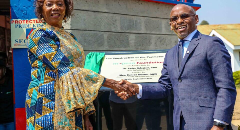 Dr. Peter Ndegwa, Group CEO of Safaricom Group (right), officially hands over a newly constructed perimeter wall funded by the M-Pesa Foundation to Mrs. Eunice Mathu, Chairperson of the Starehe Girls Centre Board of Trustees.