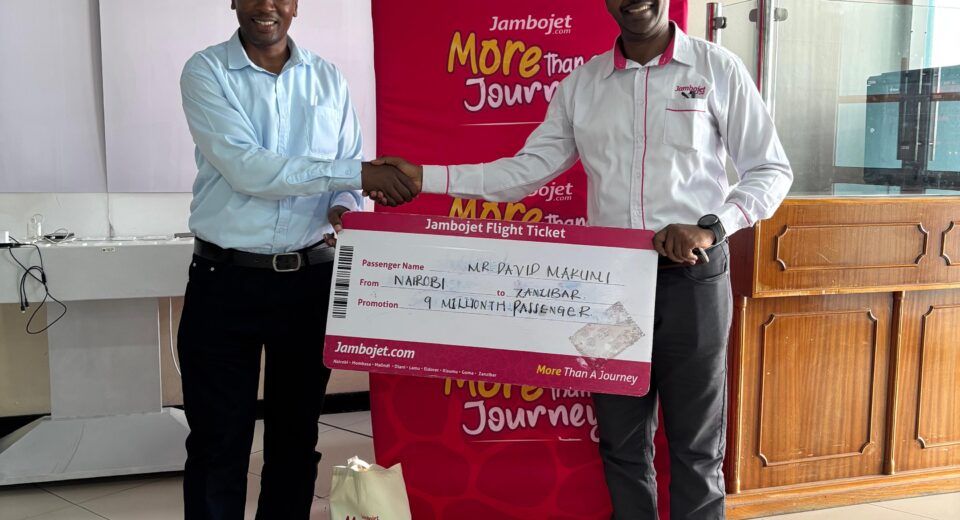 Jambojet CEO & MD, Mr. Karanja Ndegwa with its 9 millionth passenger, Mr. David Makumi