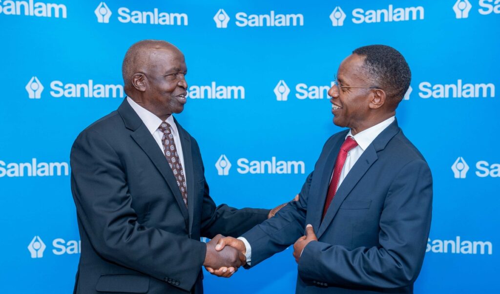Sanlam Kenya PLC Chairman Dr John Simba (left) shares a light moment with the company's Group CEO Dr Patrick Tumbo (right) at a past event