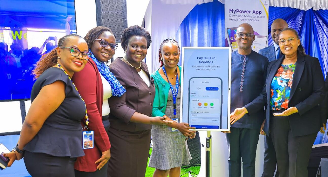 Kenya Power’s Board Director Ruth Muiruri (left) and the General Manager for Commercial Services & Sales Eng. Rosemary Oduor (right) present a gift to Mr. Deeyn Shah from Shrink Pack Limited. Mr Shah represented his Company during the launch of Kenya Power’s Digital Customer Service Platforms at Stima Plaza, Nairobi. Shrink Pack Limited is one of Kenya Power’s Large Power customers.