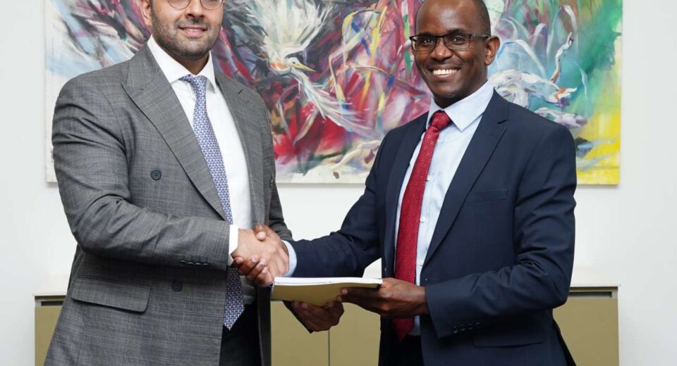 From left: Ravi Rughani, Principal at Actis and Samuel Kariuki shakes hands after the buyout