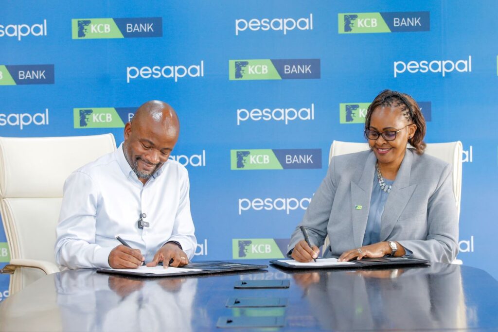 KCB Bank Kenya Managing Director, Annastacia Kimtai, and Pesapal Founder, Agosta Liko, during the signing of a strategic partnership between KCB Bank Kenya and Pesapal Limited. The collaboration will digitize fuel station operations across East Africa through Pesapal’s Forecourt Management Solution, enhancing efficiency, transparency, and access to financing for over 10,000 fuel dealers.