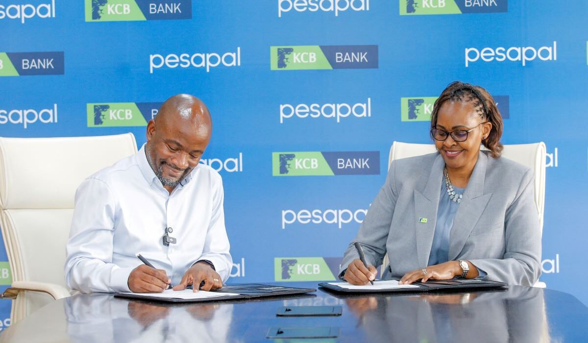 KCB Bank Kenya Managing Director, Annastacia Kimtai, and Pesapal Founder, Agosta Liko, during the signing of a strategic partnership between KCB Bank Kenya and Pesapal Limited. The collaboration will digitize fuel station operations across East Africa through Pesapal’s Forecourt Management Solution, enhancing efficiency, transparency, and access to financing for over 10,000 fuel dealers.