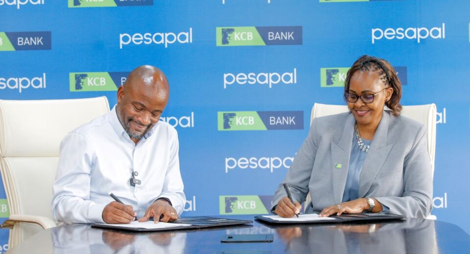 KCB Bank Kenya Managing Director, Annastacia Kimtai, and Pesapal Founder, Agosta Liko, during the signing of a strategic partnership between KCB Bank Kenya and Pesapal Limited. The collaboration will digitize fuel station operations across East Africa through Pesapal’s Forecourt Management Solution, enhancing efficiency, transparency, and access to financing for over 10,000 fuel dealers.