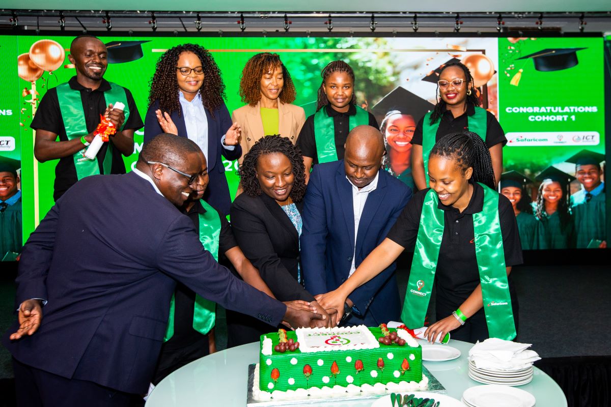 Elaine Kyalo ,HOD Fixed Network solutions at ,Safaricom,Maureen Njuguna HR cluster lead-Technology,Antony Gachanja -Director Network at Safaricom,,Linet Ringera,Director partnership innovation and capacity -ICT Authority, cutting cake with graduands during graduation ceremony of Safaricom Connect Academy Graduation