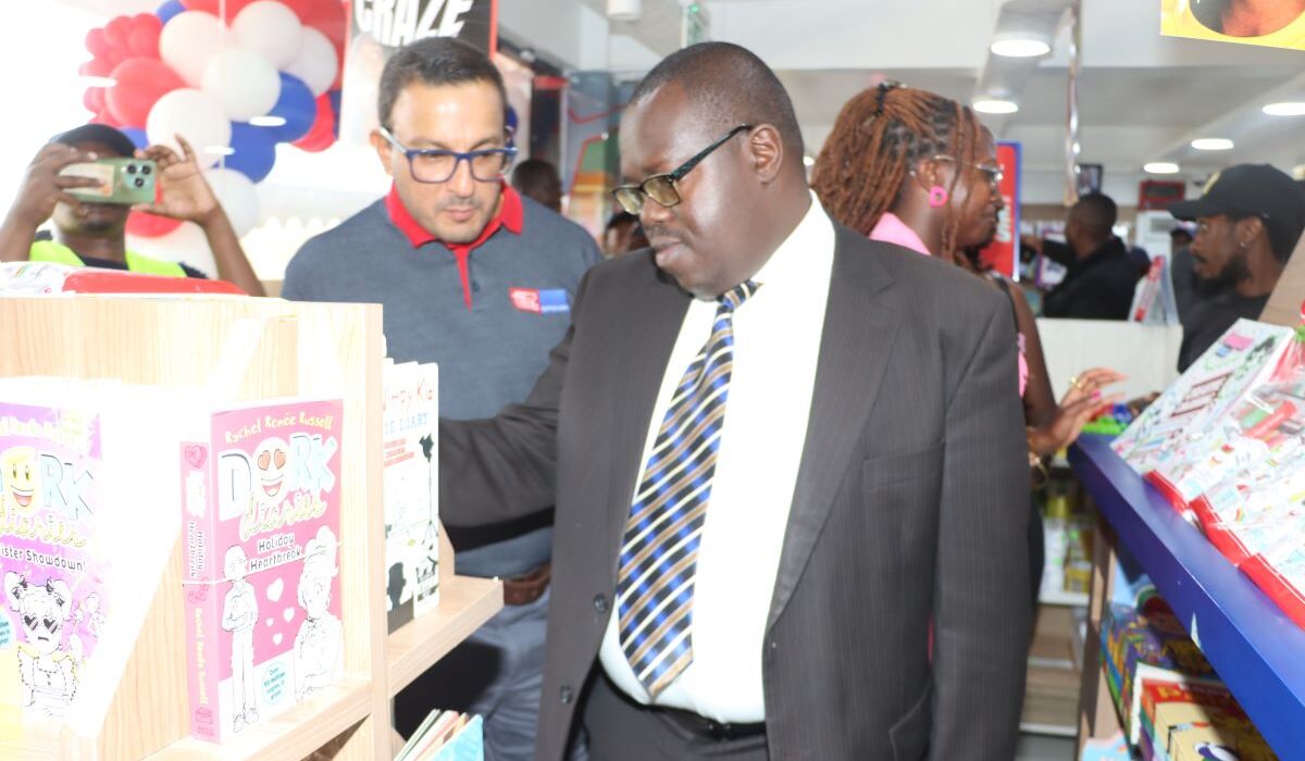 Left to Right - Sachin Varma - CEO Text Book Centre and Sylvester Metto - County Attorney, Uasin Gishu County, during the launch of the 15th Text Book Centre branch at Rupa Mall in Eldoret Town.
