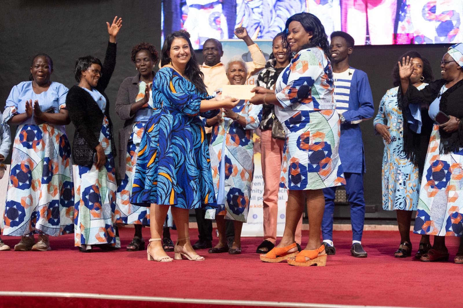 Kidogo CEO and Co- founder Sabrina Habib celebrating with Mamaprenuers