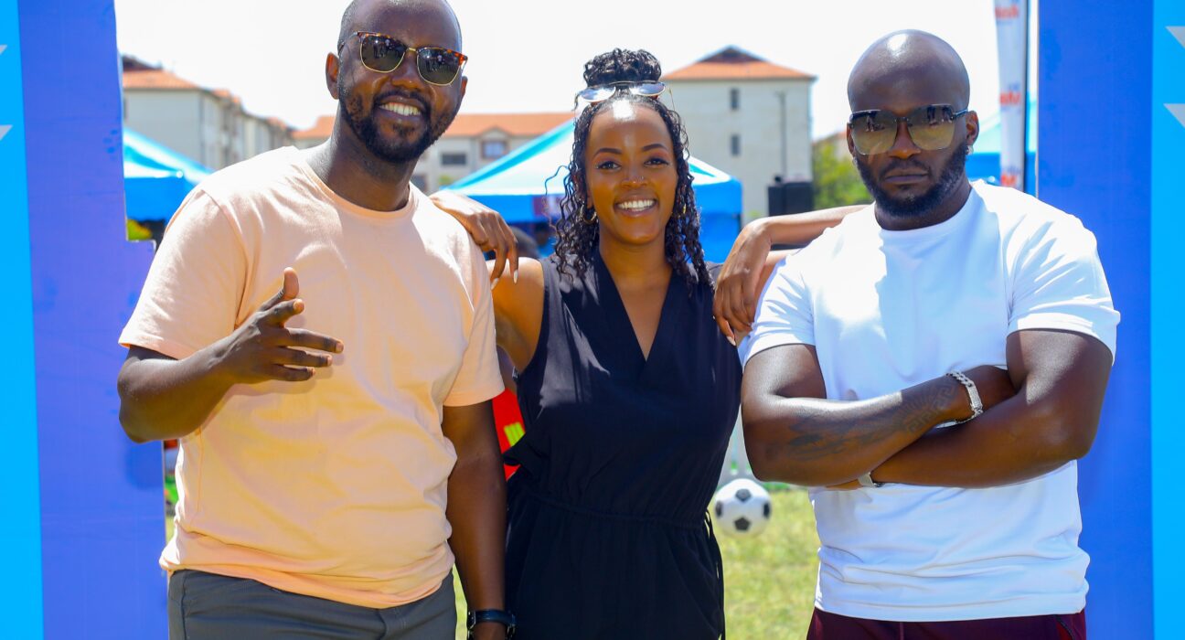 From L to R: Elisha Kamau, Public Relations Manager at MultiChoice Kenya, Evelyne Gitonga who plays Natasha on Lazizi and Alex Khayo who plays Sting on Qware pose for a photo during during the MultiChoice ALL I Want hii Krisi Festival Activation at Nyayo Estate.