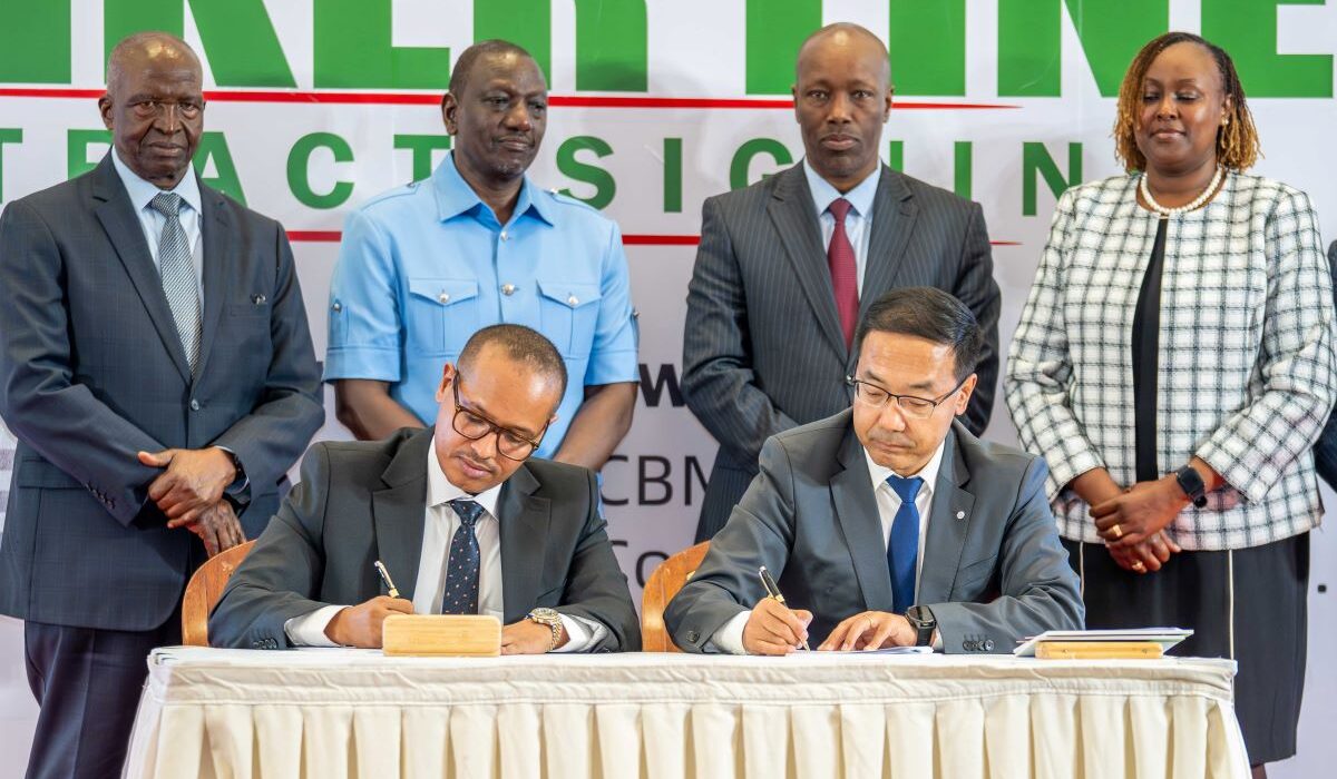 Amsons Group Managing Director Mr Edha Nahdi left and Sinoma CBMI Chairman Mr Zhang Sicai signing the US$250 million Matuga Clinker Factory Construction contract