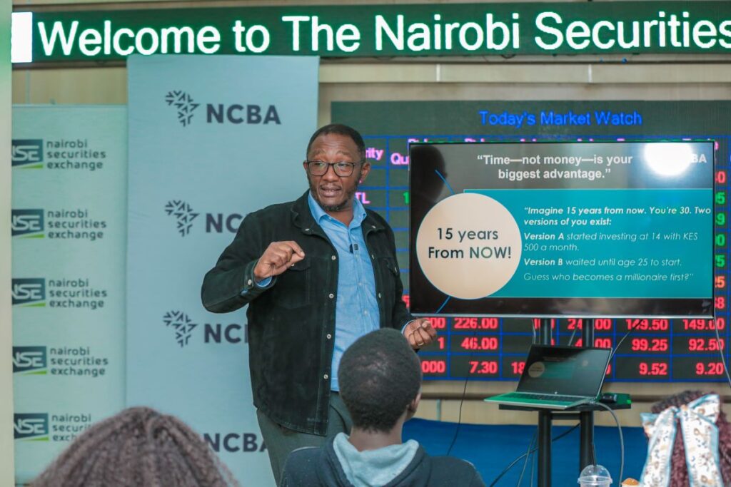 Samuel Gichohi, Head of Business Development, NCBA Investment Bank, taking the teens through Online Share Trading during the NCBA and Abojani Teens Financial Literacy and Early Investor Empowerment Workshop at the Nairobi Securities Exchange.