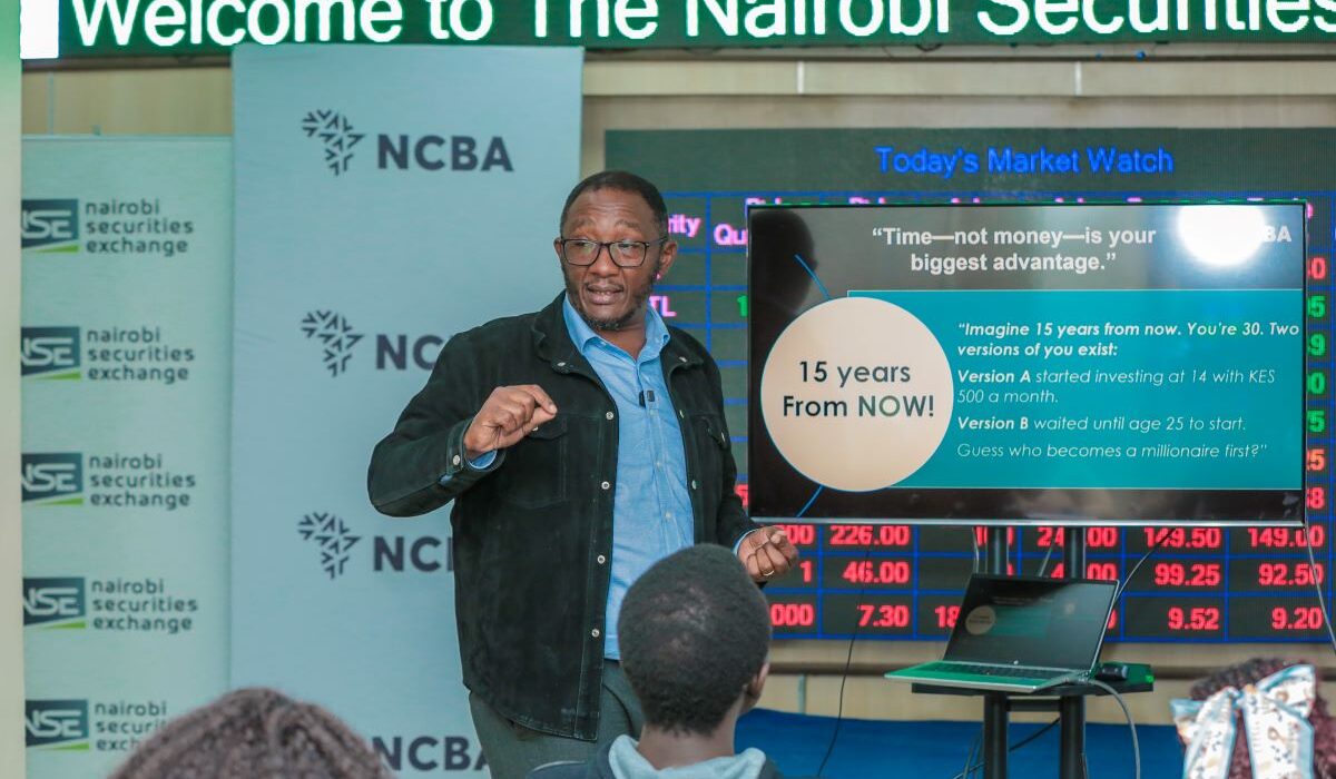 Samuel Gichohi, Head of Business Development, NCBA Investment Bank, taking the teens through Online Share Trading during the NCBA and Abojani Teens Financial Literacy and Early Investor Empowerment Workshop at the Nairobi Securities Exchange.