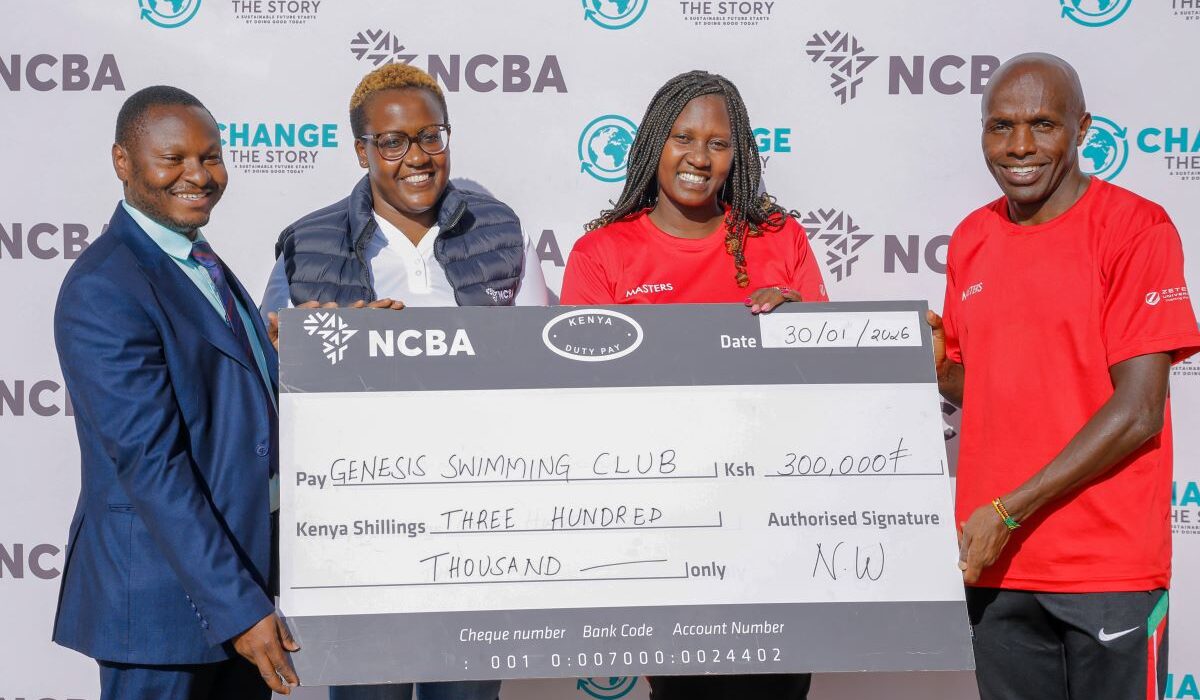 From left- Bernard Mariga- RM NCBA Tatu City Branch, Caroline Wangari- Head of Citizenship & Sponsorship at NCBA hands over a dummy cheque to Trizah Waithira- Team Chaperone- Kenya Masters and Peter Nduati- Team Captain- Kenya Masters during a joint training session at Crawford International School.