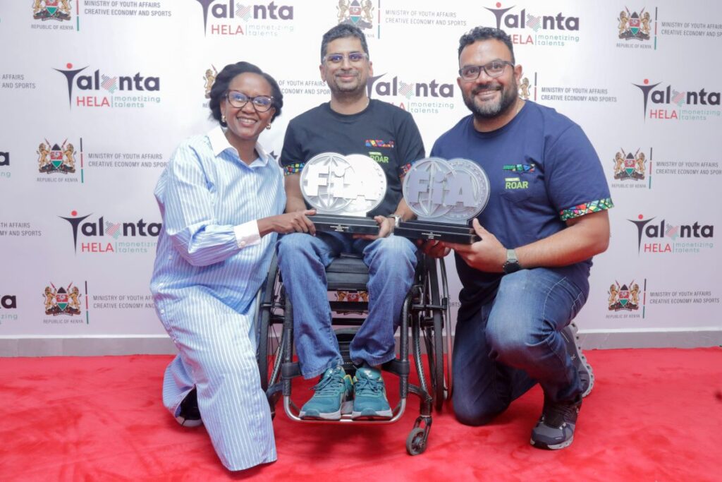 From Left: KCB Group Director Marketing and Communications Rosalind Gichuru, Nikhil Sachania, and Deep Patel during the official handover of the FIA ARC3 Title at the Talanta Plaza, Upperhill, Nairobi.