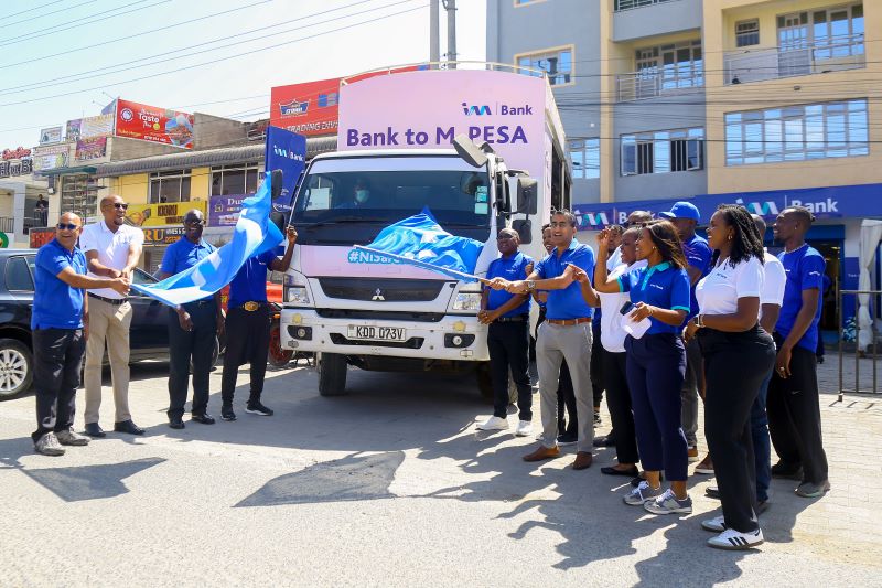 I&M Bank Team led by Director, Retail & Business Banking, Shameer Patel and Head of Distribution, Stanley Gachoki during the official flag-off for the I&M truck during the opening of the Kitengela Branch.