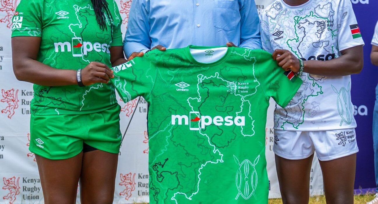 From left: Sheila Chajira, Captain of the Kenya Lionesses; Victor Odada, Strategic Partnership Lead for M-PESA; and Freshia Awino, Vice Captain of the Lionesses, during the team and kit unveiling for the HSBC 7s tournament at the RFUEA Grounds in Nairobi.