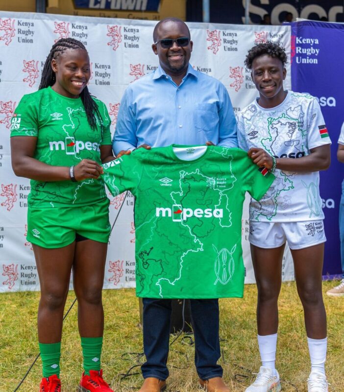 From left: Sheila Chajira, Captain of the Kenya Lionesses; Victor Odada, Strategic Partnership Lead for M-PESA; and Freshia Awino, Vice Captain of the Lionesses, during the team and kit unveiling for the HSBC 7s tournament at the RFUEA Grounds in Nairobi.