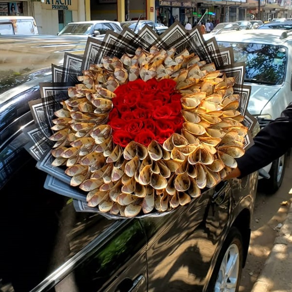 CBK Cautions Kenyans Over Cash Flower Bouquets, Citing Currency Damage Risks